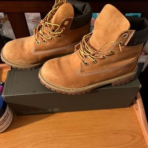 Timberland boots. Worn a couple time. Minor scuffs
